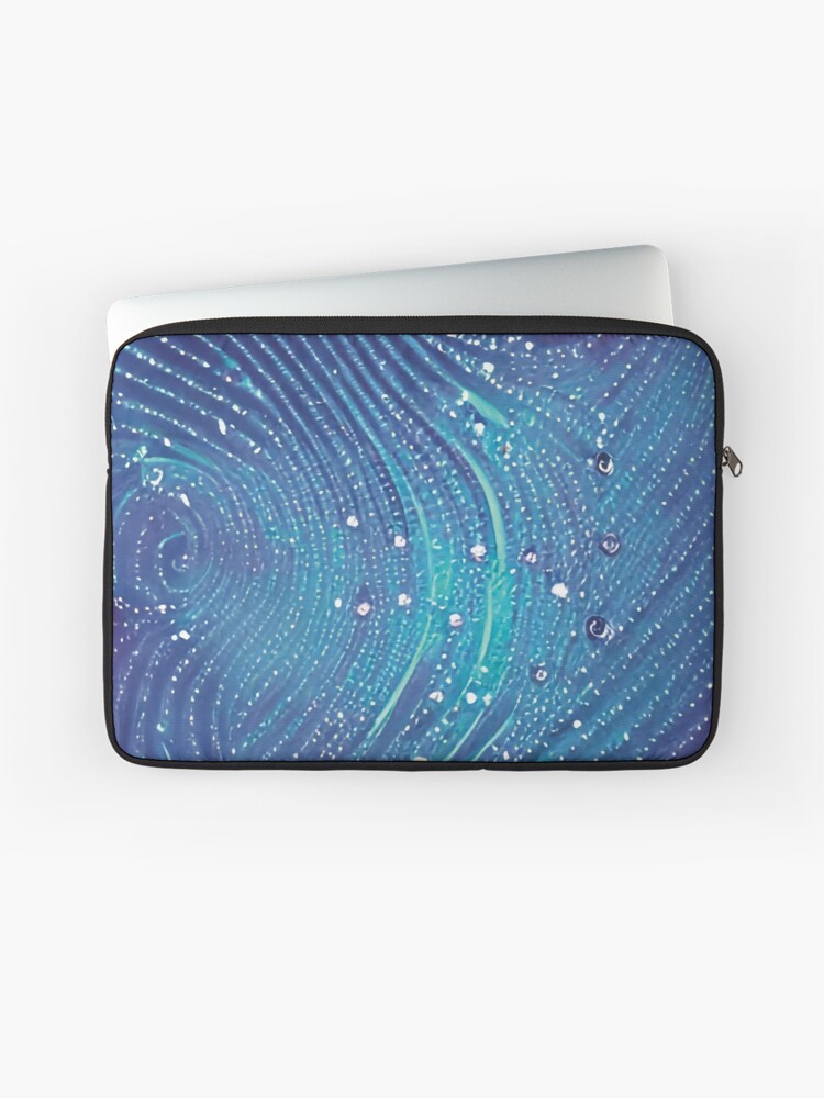 A stunning laptop case with blue swirls and tiny lights. Zippered and lined for protection and comfort.